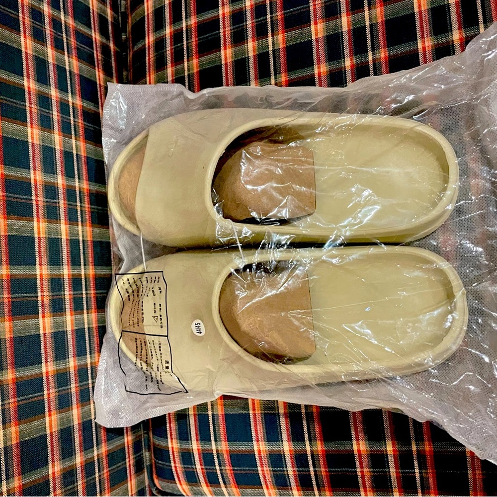 Men’s tan slides. Size 9